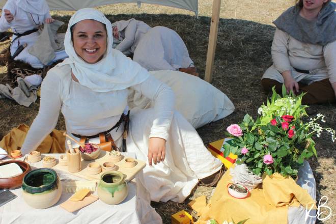 Medieval lady with pottery and flowers