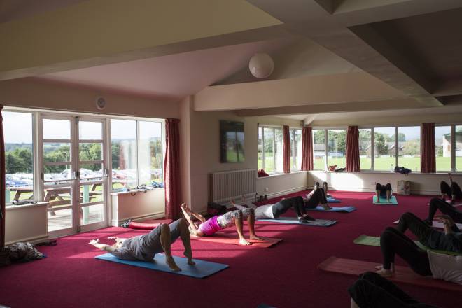 Pilates class in the A.W. Jenkinson Suite